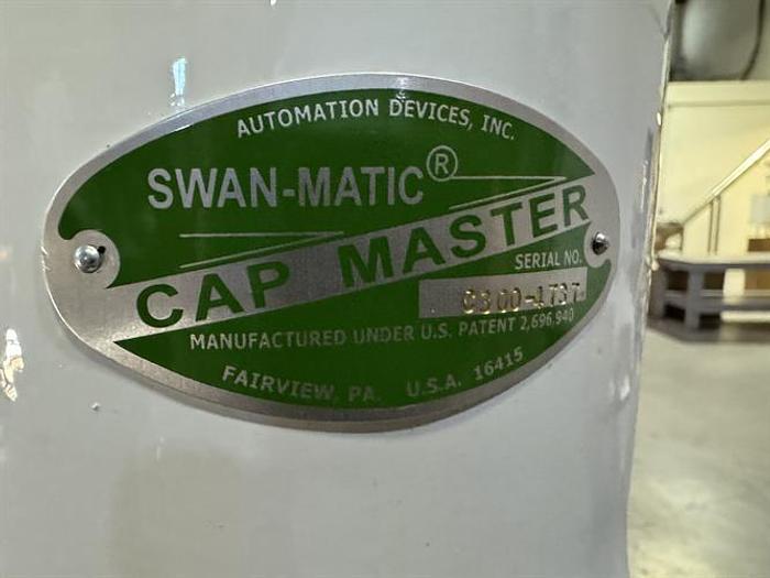 Used Swanmatic model C300 Cap Master semi-automatic capper