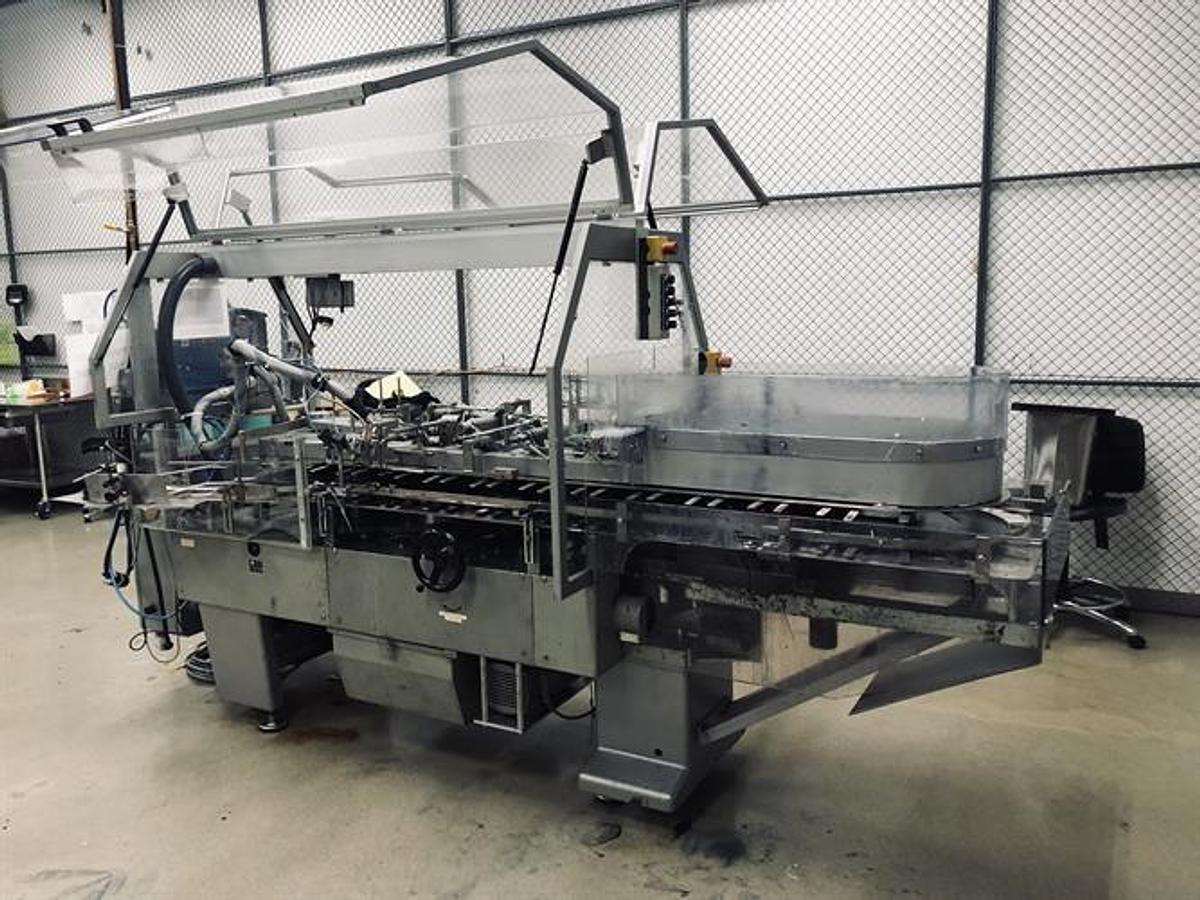Used CAM model AV06 semi-automatic vertical glue cartoner