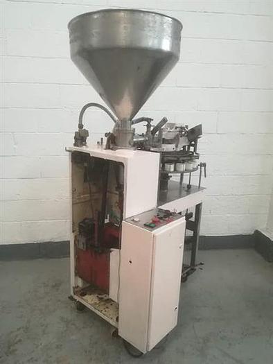 Used Kalix model KX plastic  tube filler and sealer