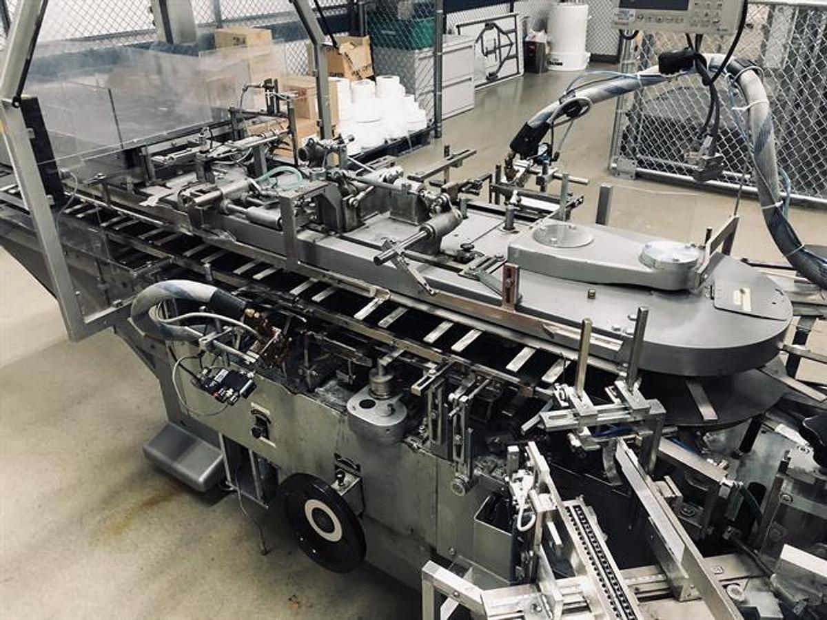 Used CAM model AV06 semi-automatic vertical glue cartoner