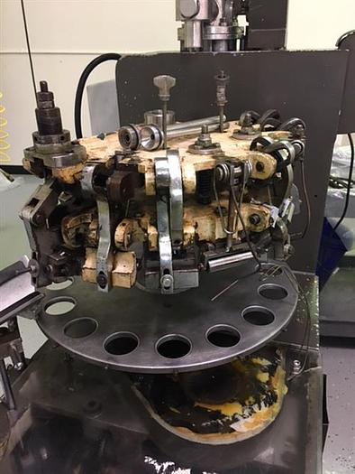 Used Kalix model KX67B 16-Station Tube filler and sealer