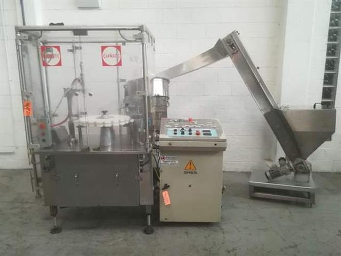 Used Capmatic Patriot FC21 monoblock filler and capper
