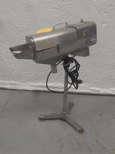 Used Manesty stainless steel table deduster.