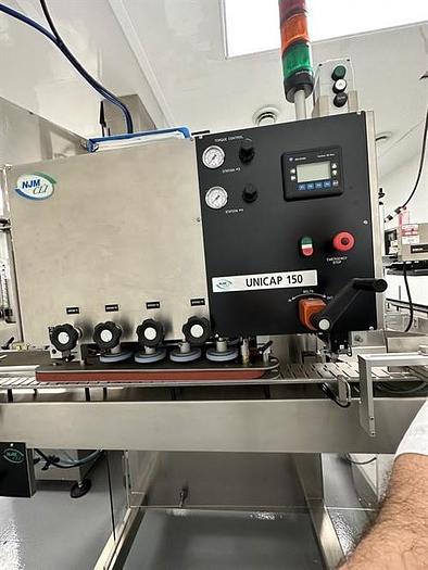 Used NJM Solid Dose Bottle Filling Line