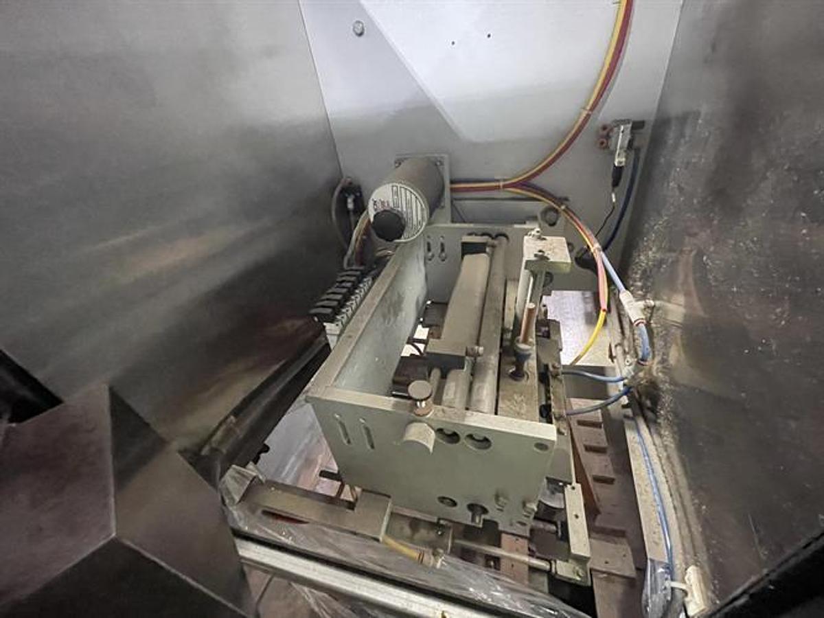 Used Axon Model EZ300 Shrink Sleeve and bander with Perforator