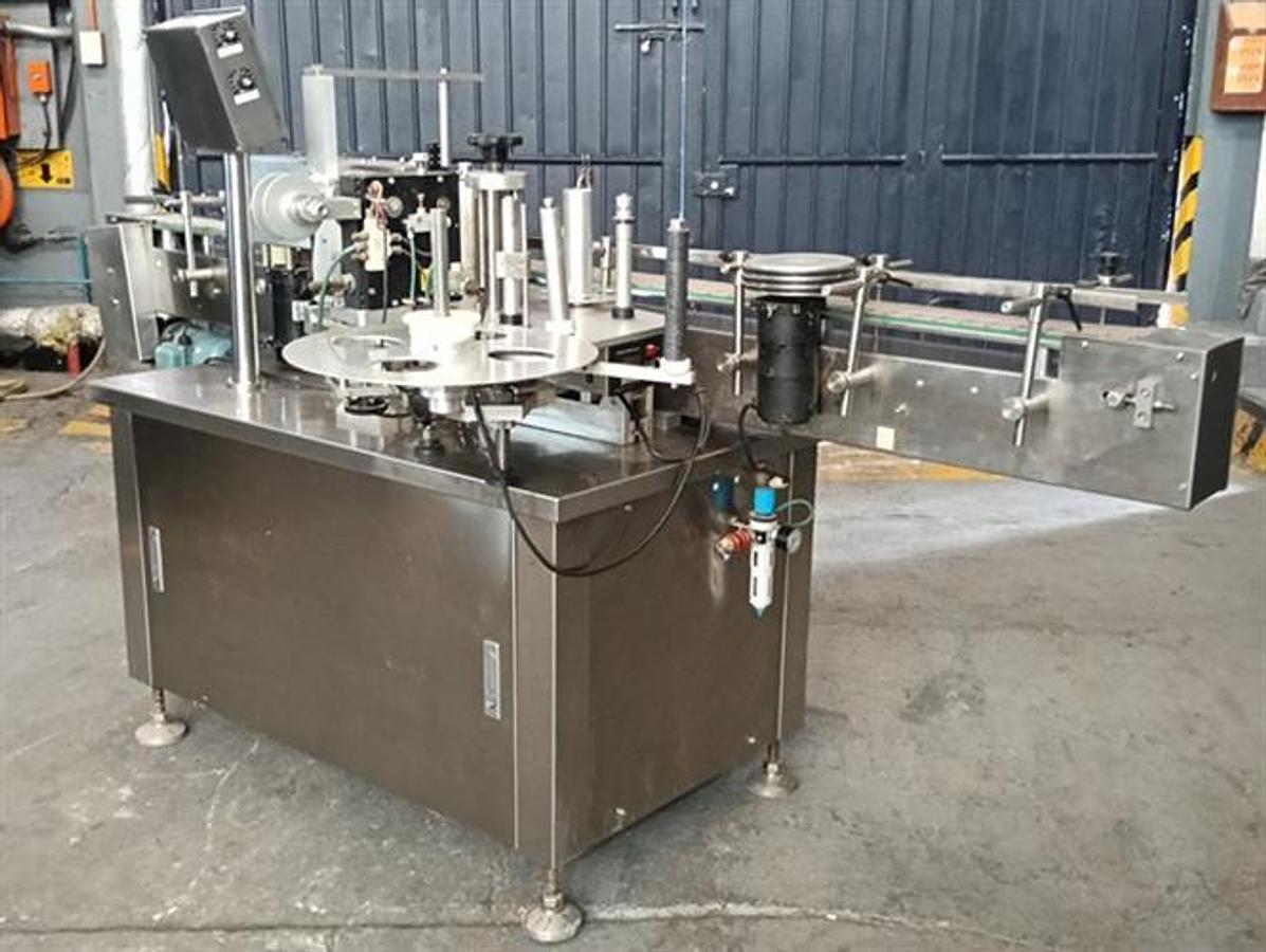 Used Cima model TPY-2000 stainless steel wraparound labeler