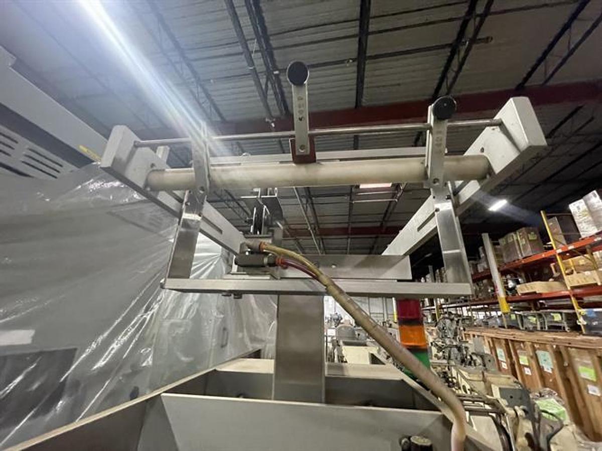 Used Axon Model EZ300 Shrink Sleeve and bander with Perforator