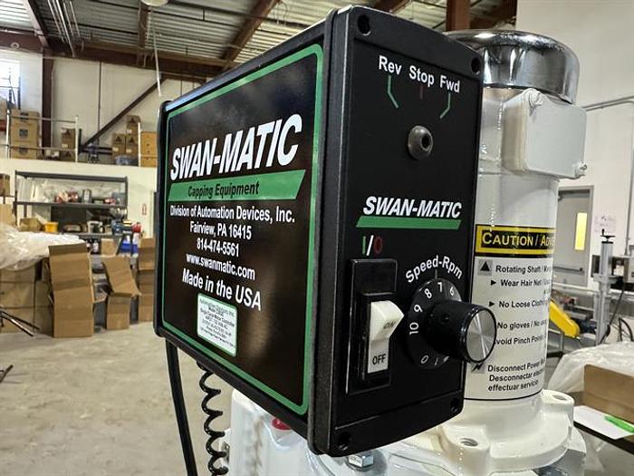 Used Swanmatic model C300 Cap Master semi-automatic capper