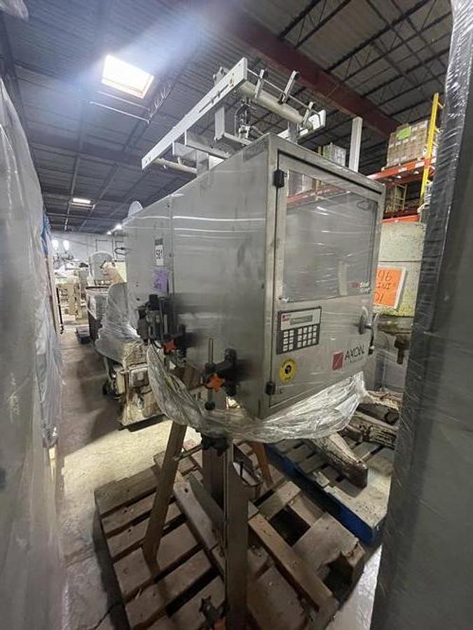 Used Axon Model EZ300 Shrink Sleeve and bander with Perforator