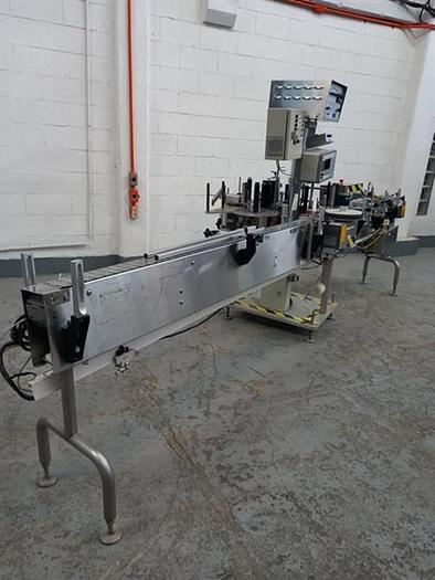 Used Kalish stainless steel  model  6801 wraparound pressure sensitive labeler