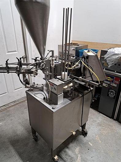 Used Quality Cup model QC-8 Rotary Cup Filler & Sealer