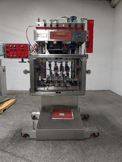 Used Pack West Auto 200 8 spindle capper
