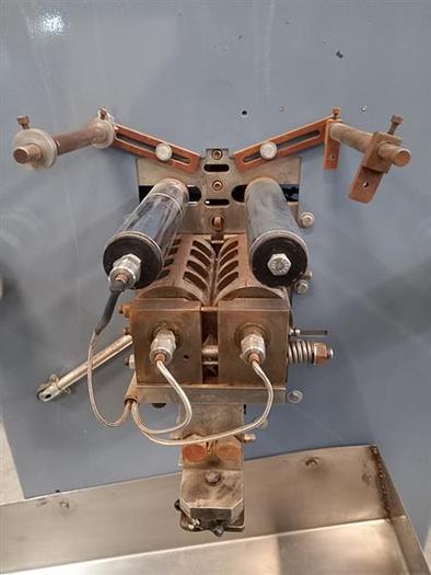 Used Dibago model DBB-4X Strip Packager - Vibratory