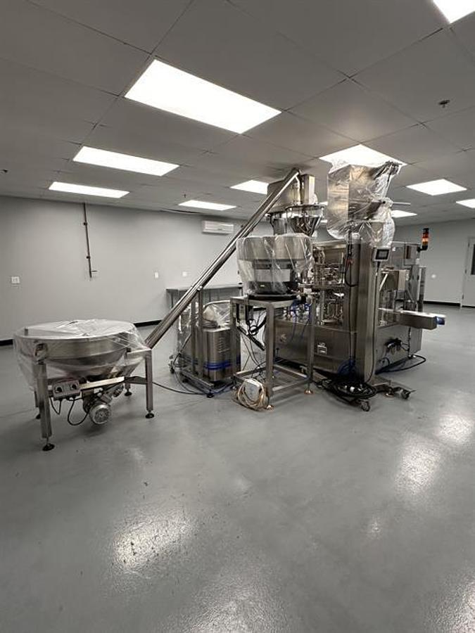 Used New Genesis Pre-Made Rotary Bagger With Auger Filler