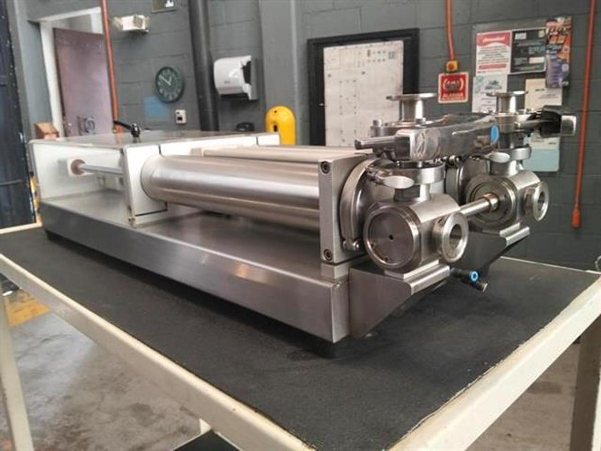Used Cleveland model SGP-D-1002 stainless steel piston filler