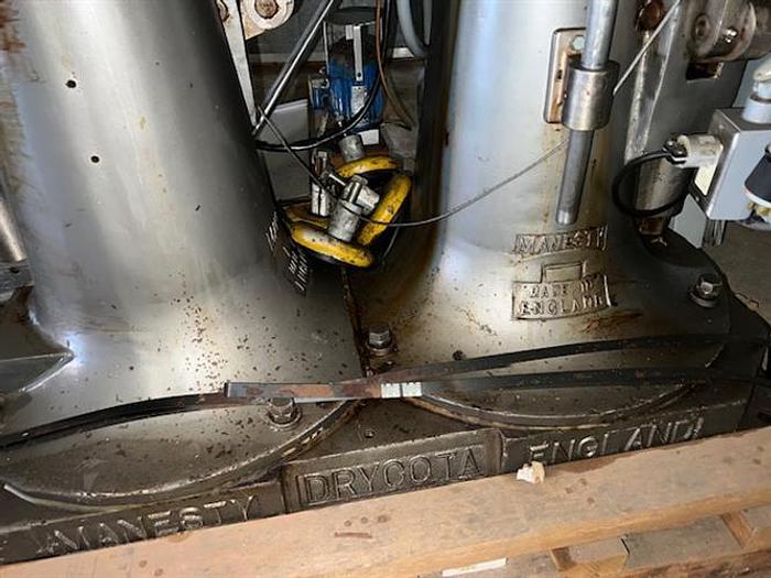 Used Manesty model Drycota 23 station consisting of (2) presses with transfer system