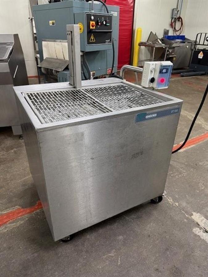 Used Ultra Source Ultravac 880 vacuum packager & Henkelman DT 100 diptank