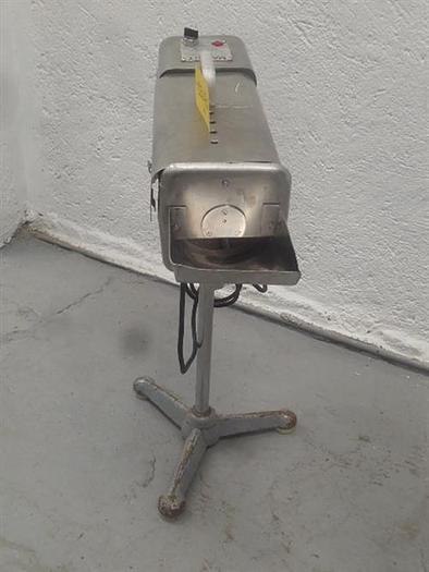 Used Manesty stainless steel table deduster.