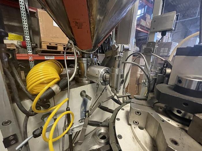Used Kalix 16-Station Hot Jaw Tube Filler