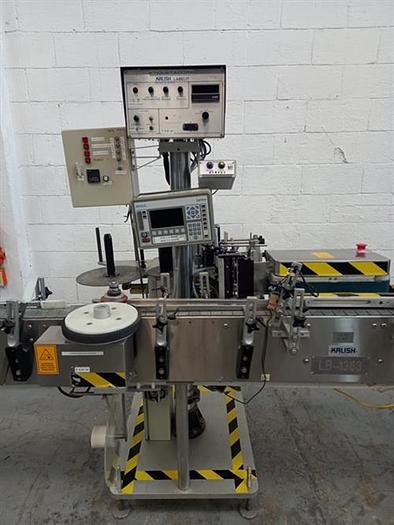 Used Kalish stainless steel  model  6801 wraparound pressure sensitive labeler
