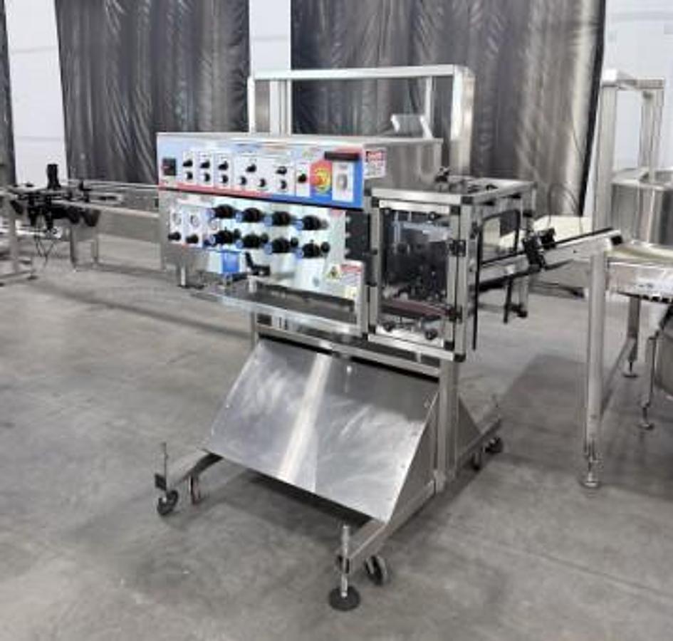 Used E-Pak 4-Spindle Capper with Sorter & Elevator