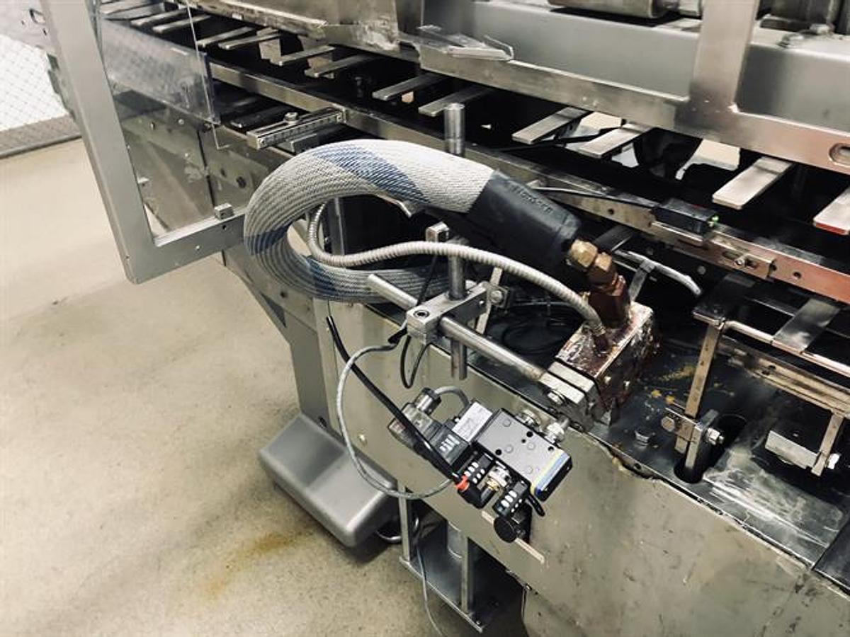 Used CAM model AV06 semi-automatic vertical glue cartoner