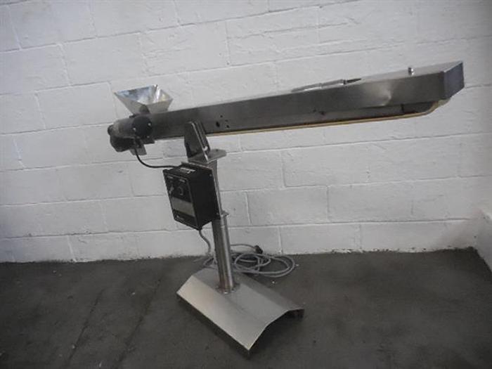 Used Kramer model 1600 Stainless Steel Tablet Feeder