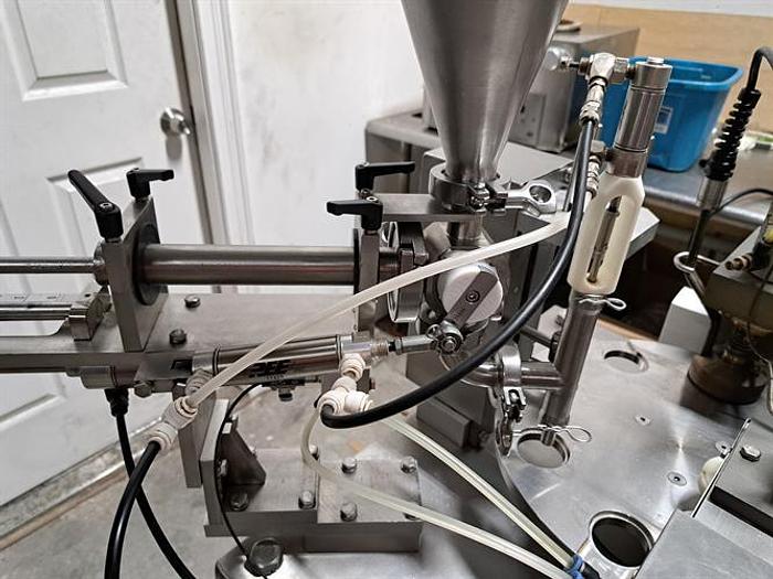 Used Quality Cup model QC-8 Rotary Cup Filler & Sealer