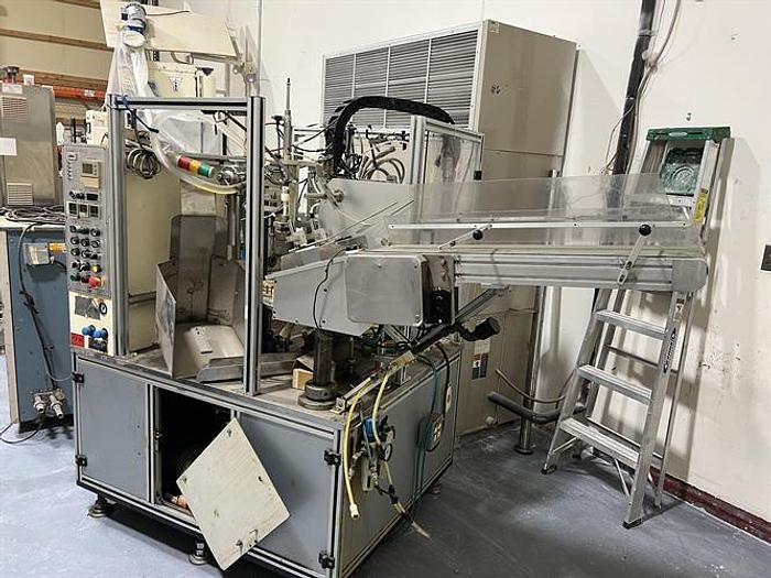 Used Woojung Model Tubefil-1000 Plastic Tube Filler and Sealer