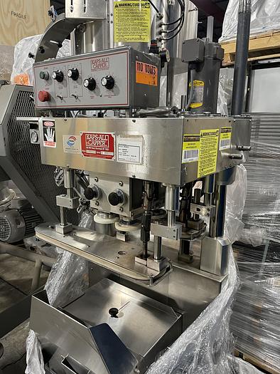 Used Kaps-All model E 4 spindle capper