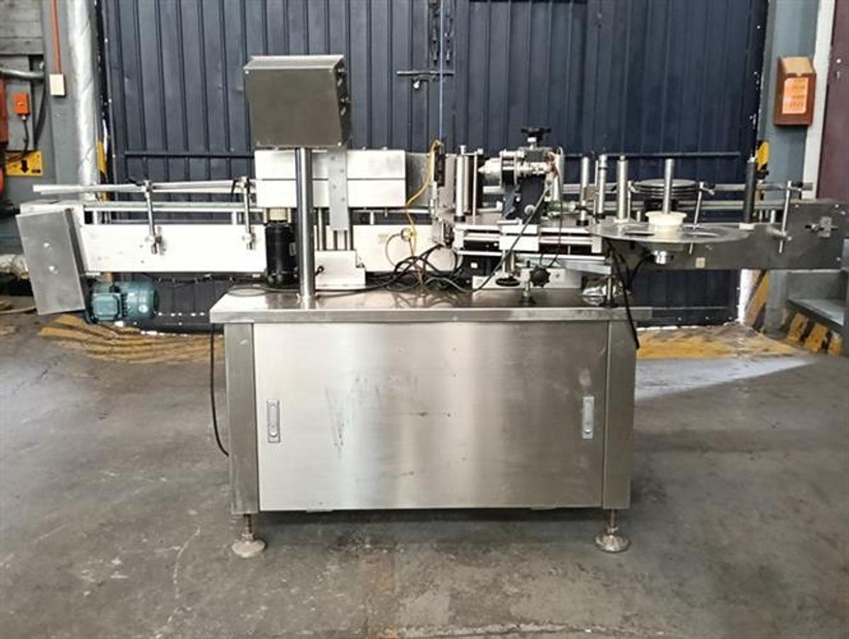 Used Cima model TPY-2000 stainless steel wraparound labeler