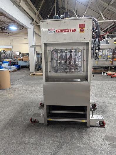 Used Pack West Auto 200 8 spindle capper