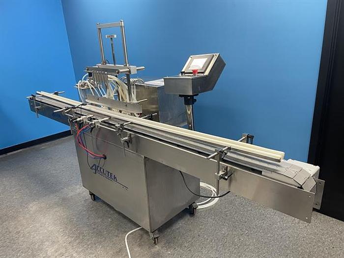 Used Accutek Accuvac 6-head Vacuum Filler