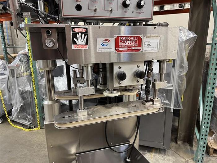 Used Kaps-All model E 4 spindle capper