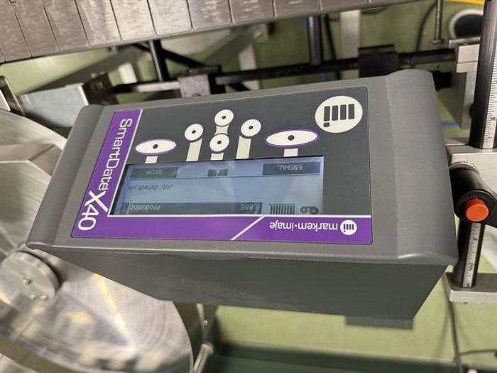 Used Quadrel model Moduline pressure sensitive wraparound labeler