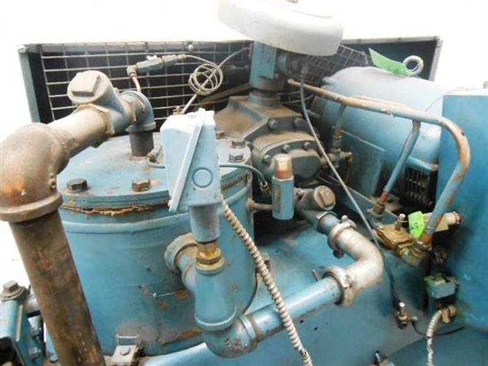 Used Twistair model LTA020-TA04 Air Compressor.