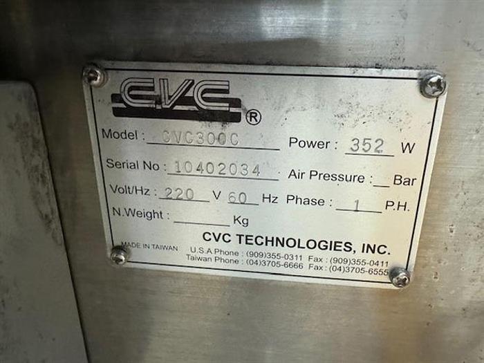 Used CVC model 300 wraparound pressure sensitive labeler with 28" accumulating table