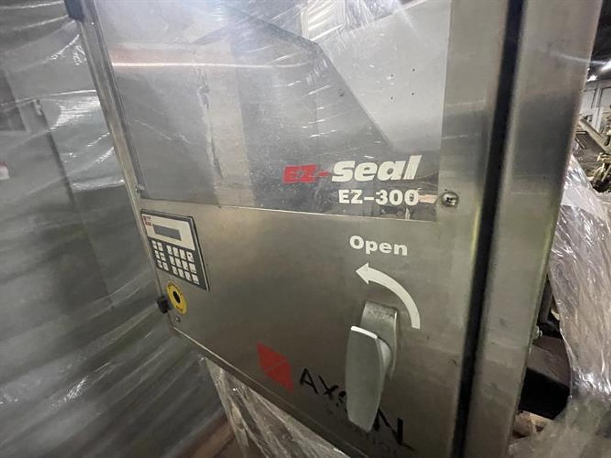 Used Axon Model EZ300 Shrink Sleeve and bander with Perforator