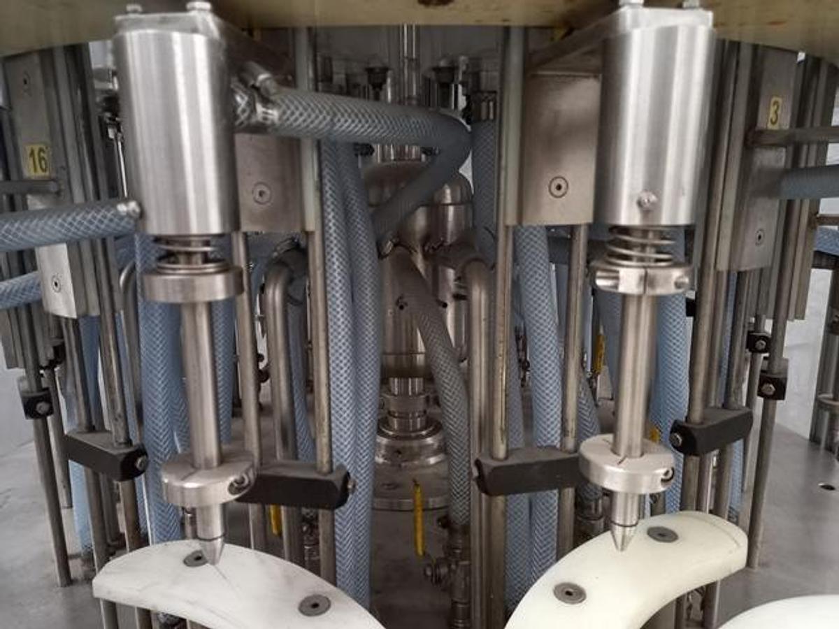 Used Laub Hunt Stainless steel 16 head rotary filler