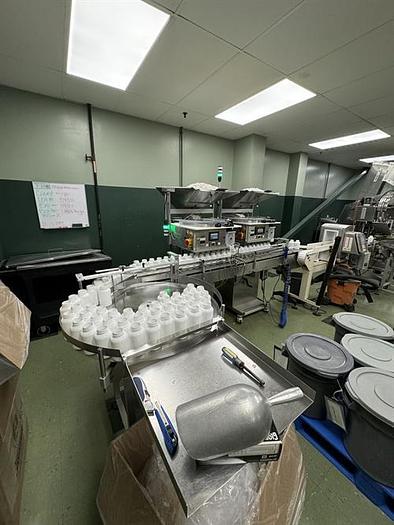 Used Pharmafill Model TC3 automatic dual lane tablet/capsule filling line