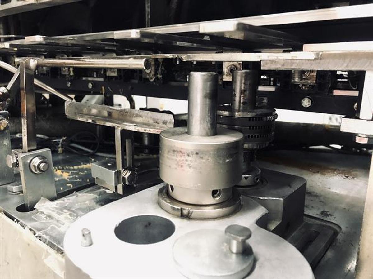 Used CAM model AV06 semi-automatic vertical glue cartoner