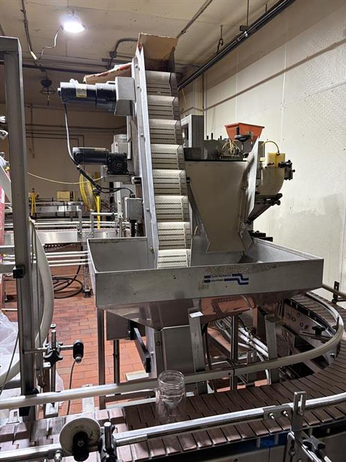 Used Fluid Packaging Solutions 6 Spindle Capper