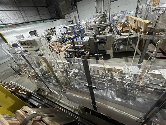 Used Bartelt model IM7 Pouch Packager with AMS Auger Filler and  liquid filler