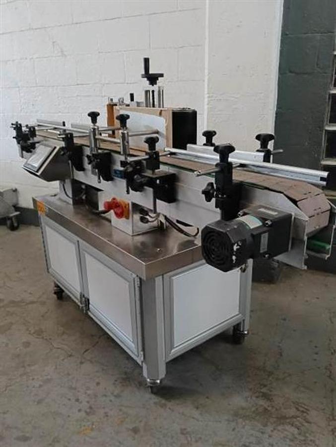 Used CVC  Stainless Steel Wraparound Labeler