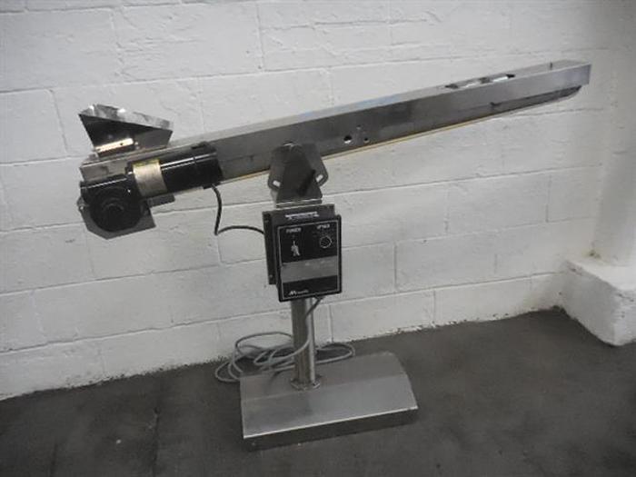 Used Kramer model 1600 Stainless Steel Tablet Feeder