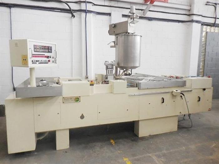 Used Sarong model SSA S6 filler and sealer suppositories