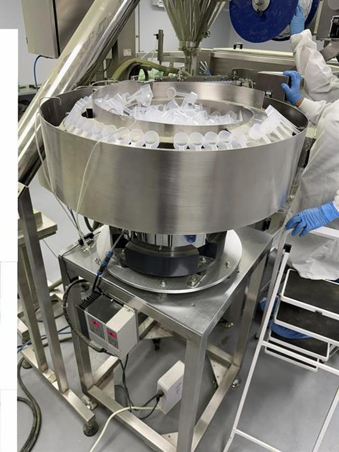 Used New Genesis Pre-Made Rotary Bagger With Auger Filler And Desiccant & Pouch Feeders