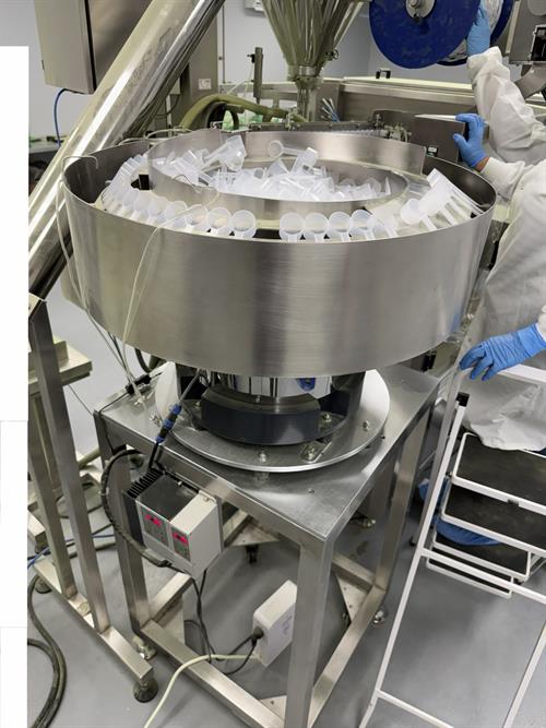 Used New Genesis Pre-Made Rotary Bagger With Auger Filler And Desiccant & Pouch Feeders