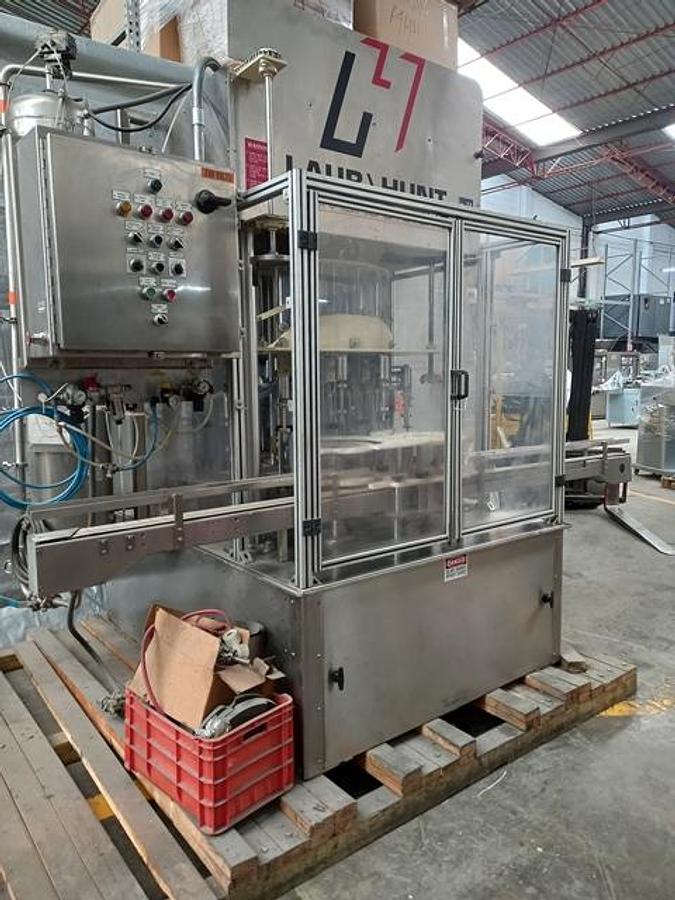 Used Laub Hunt Stainless steel 16 head rotary filler