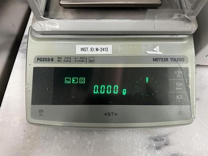 Used Mettler Toledo model PG203-S analytical scale with LV11 automatic feeder